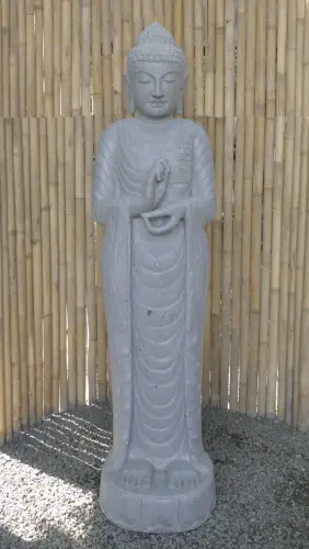 Product image of the product “Standing Buddha made of Riverstone in Dharmachakra position - gesture of wheel of the teaching of Dharma. About 180cm height. ”